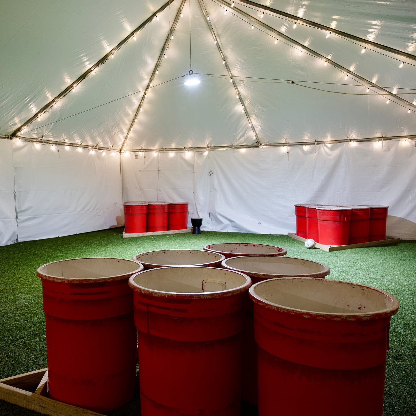 image of giant beer pong in a heated tent